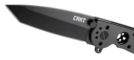 Folding knife with 'CRKT' branding on a clear background