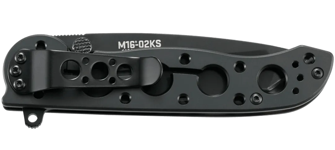 Black folding knife with visible branding on a white background