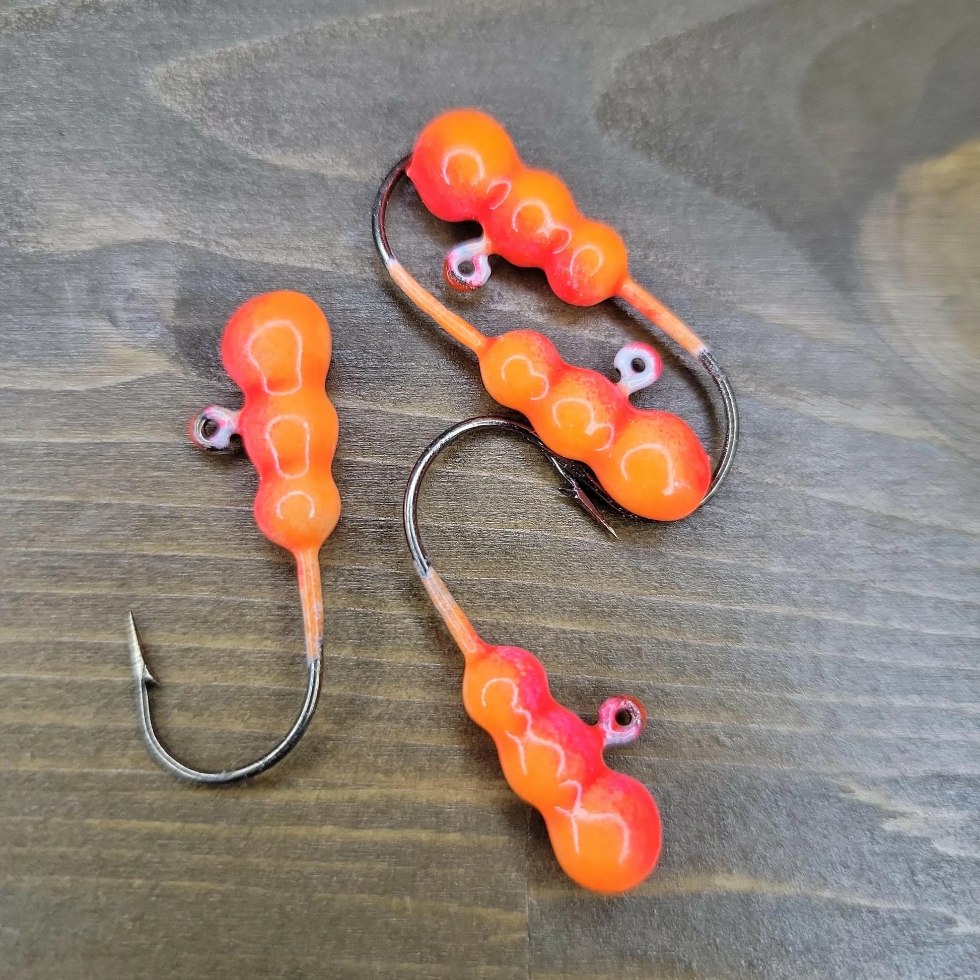 Big Sky Gruesome Grubs Glow Jigs 1/8oz 4/pack Glow Orange/Red Splash