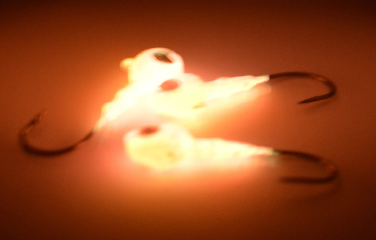 Big Sky Snake Eye 1/4oz Glow Jigs 3/pack Orange top/Pink Bottom