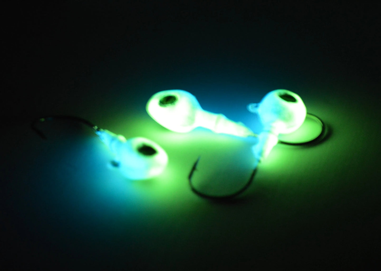 Big Sky Snake Eye 1/4oz Glow Jigs 3/pack Blue Sparkle Top/White Bottom