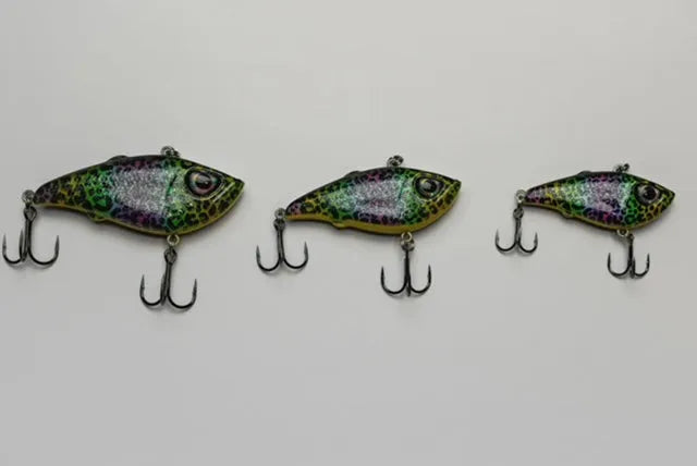 Three colorful fishing lures on a white background