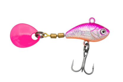 Pink and silver fishing lure on a white background