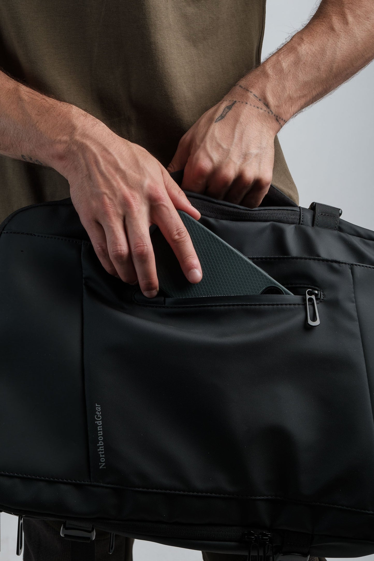 "Voyager" Expandable Backpack 26L / 38L with Built-in Rain Coat