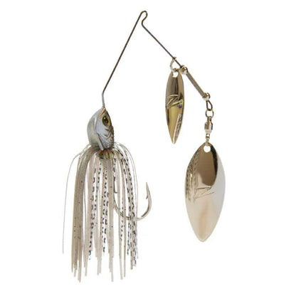 Fishing lure with metallic blades and squid skirt on a white background