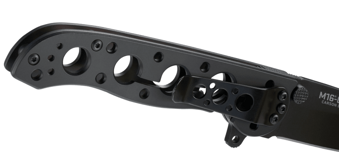 Black tactical knife handle with M16-14 marking on a clear background