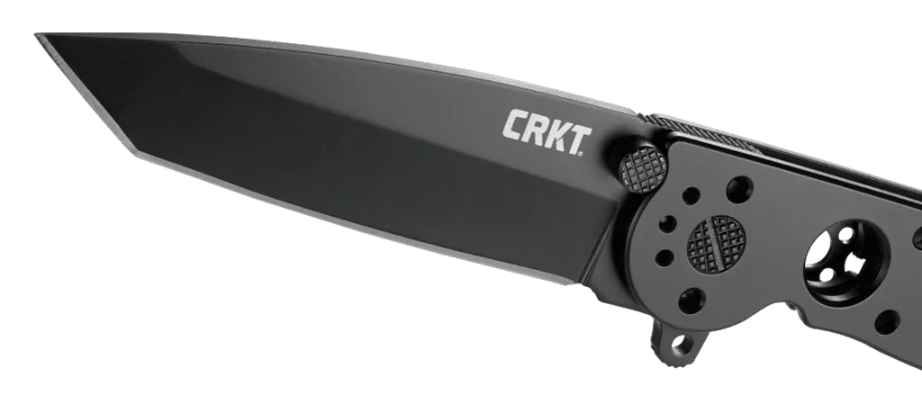 Folding knife with 'CRKT' branding on a clear background