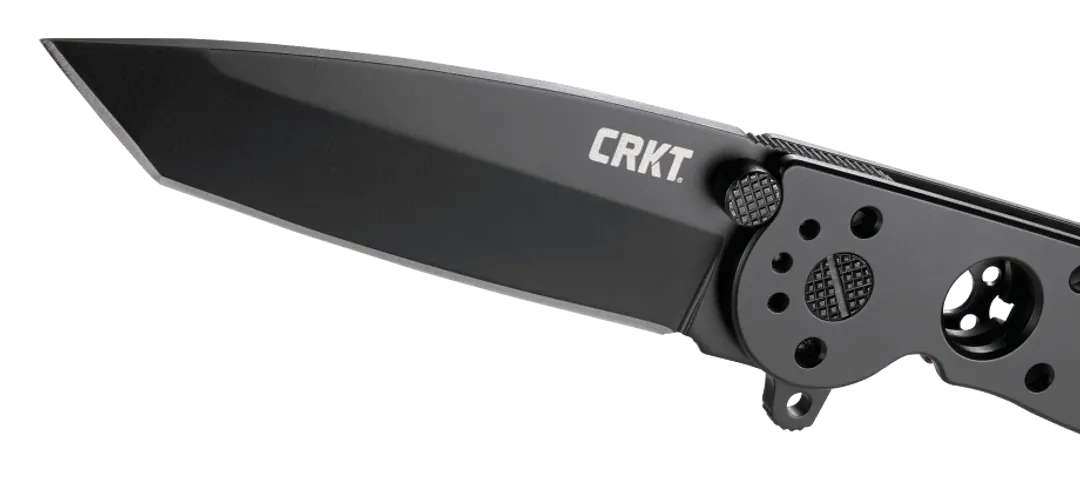 Folding knife with 'CRKT' branding on a clear background