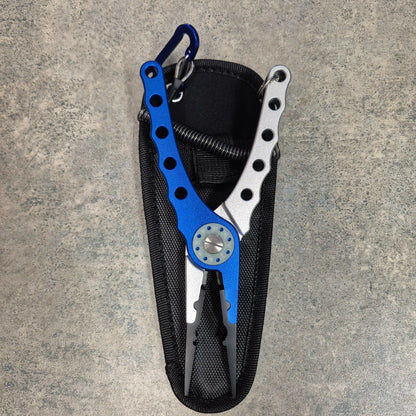 Blue and Silver Fishing pliers on grey background