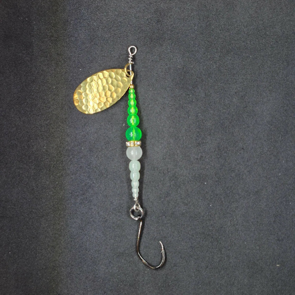 Spitfire Fishing Supermarine MK2 Wedding Ring Spinners on black background Green, Glow, Gold Blade