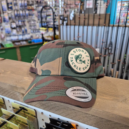 Front view of camo dad hat in store setting