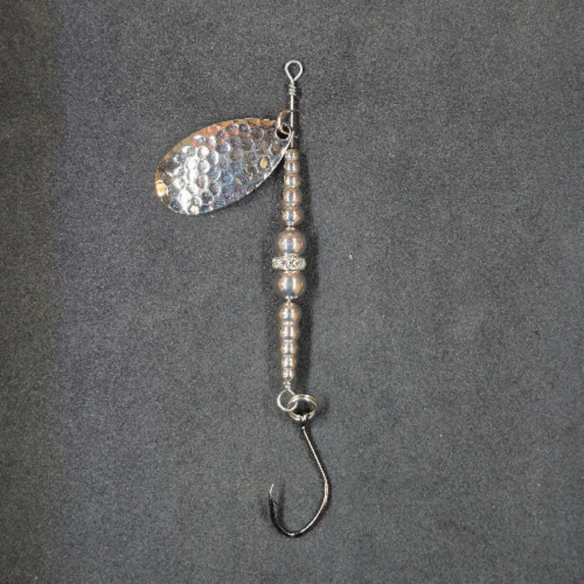 Spitfire Fishing Supermarine MK2 Wedding Ring Spinners on black background nickel, nickel, nickel blade