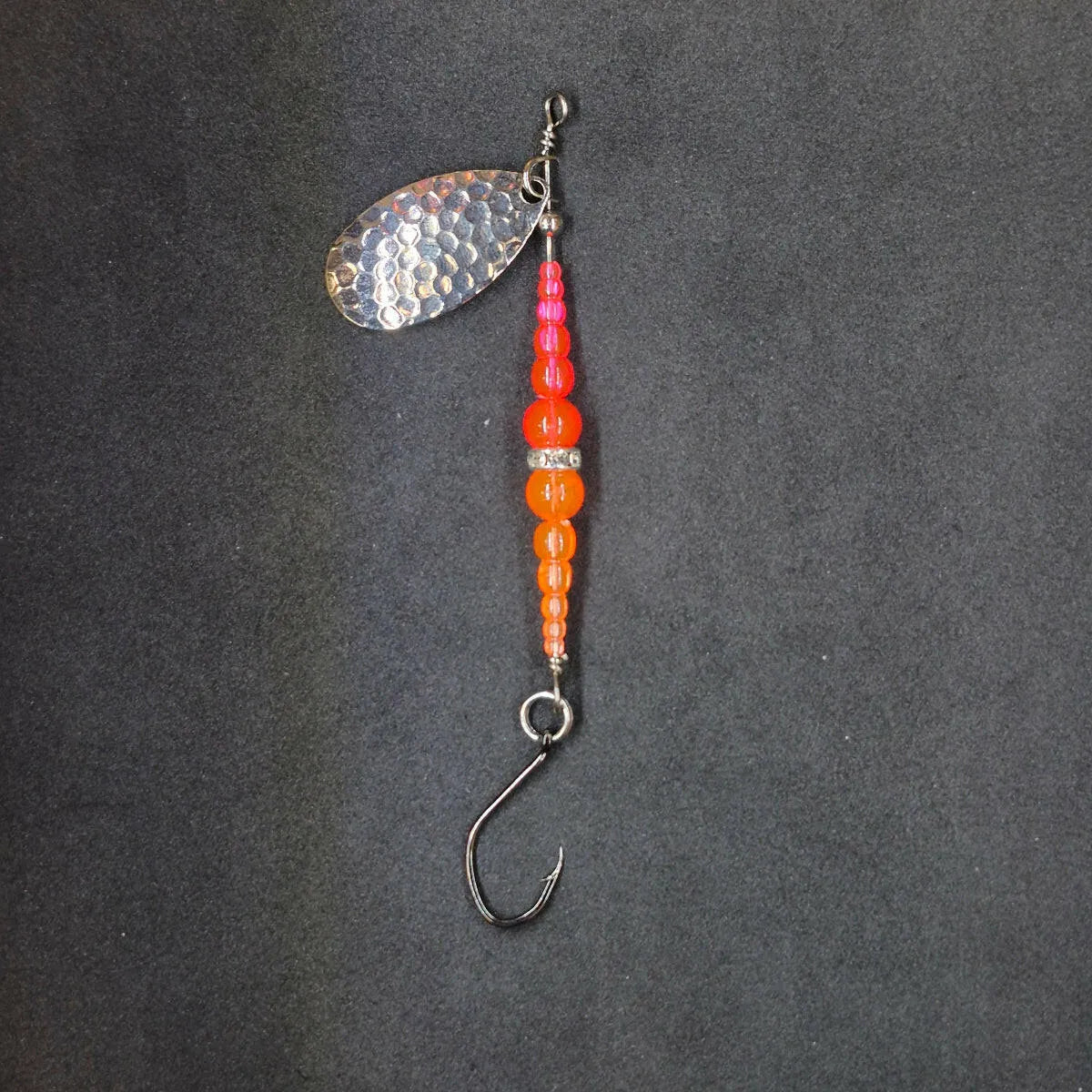 Spitfire Fishing Supermarine MK2 Wedding Ring Spinners on black background red, orange, nickel blade