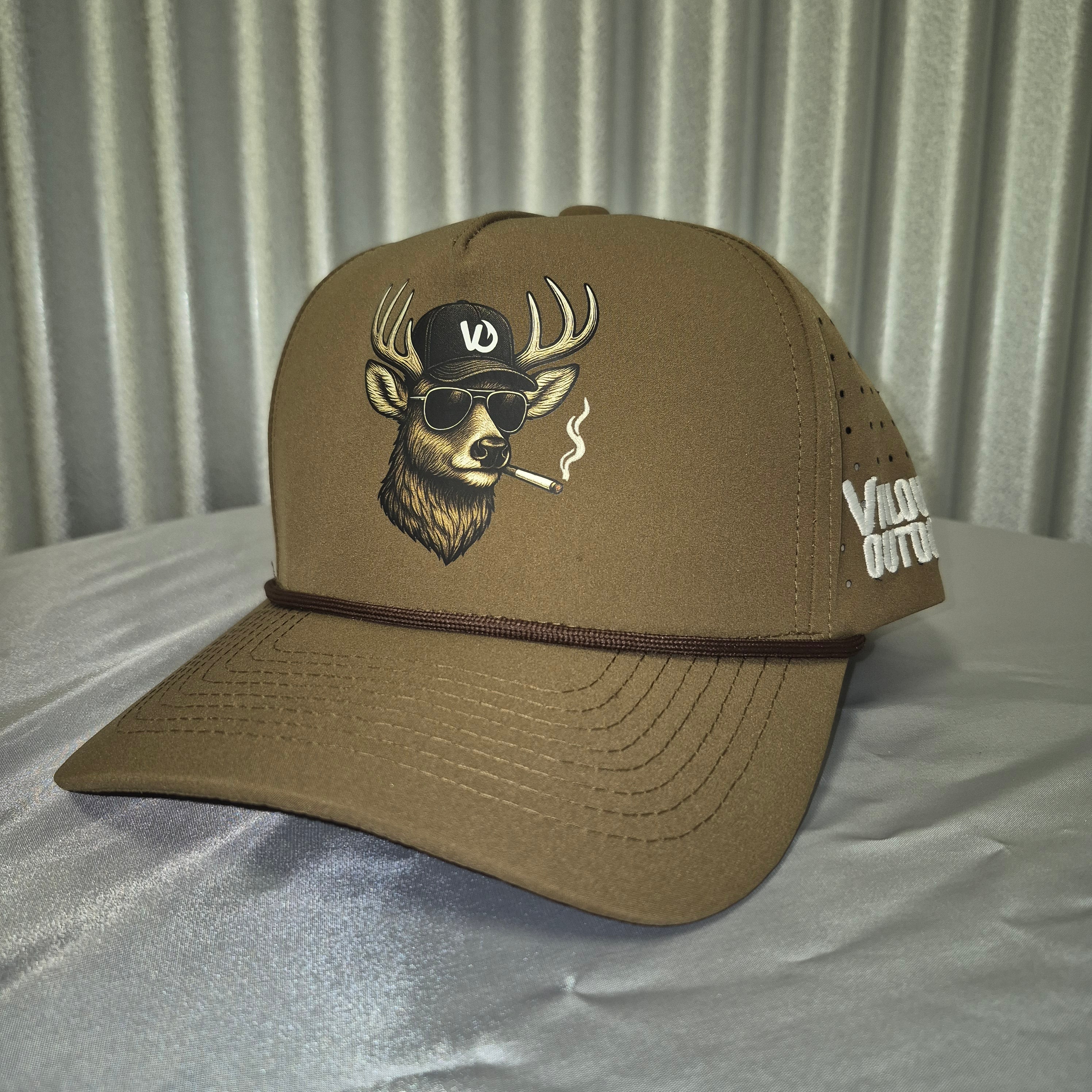 Brown cap with smokin buck design on a metallic surface