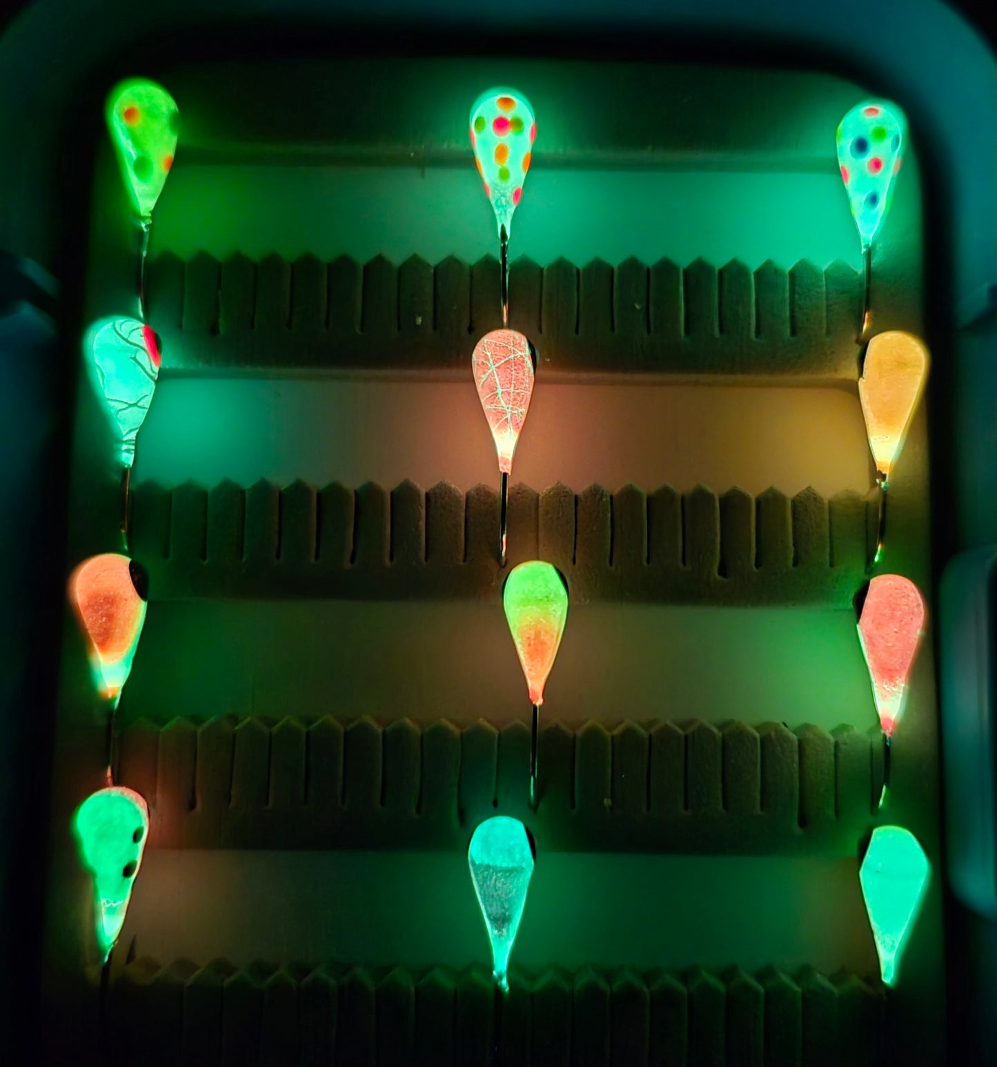 glowing fishing lures in case