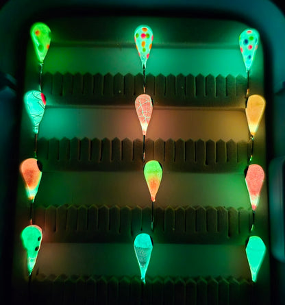 glowing fishing lures in case