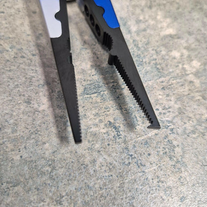 Fishing Pliers showing split ring tip on grey background