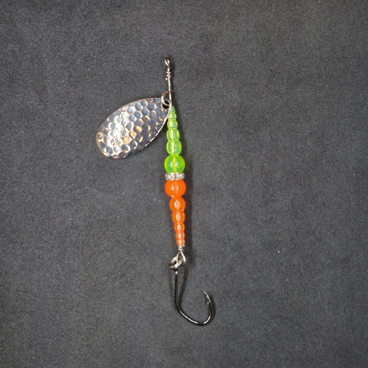 Spitfire Fishing Supermarine MK2 Wedding Ring Spinners on black background Chartreuse, orange, nickel blade