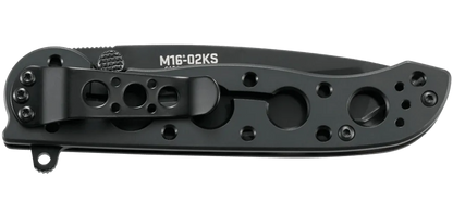 Black folding knife with visible branding on a white background