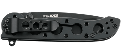 Black folding knife with visible branding on a white background