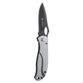 Folding knife with black blade and silver handle on a white background
