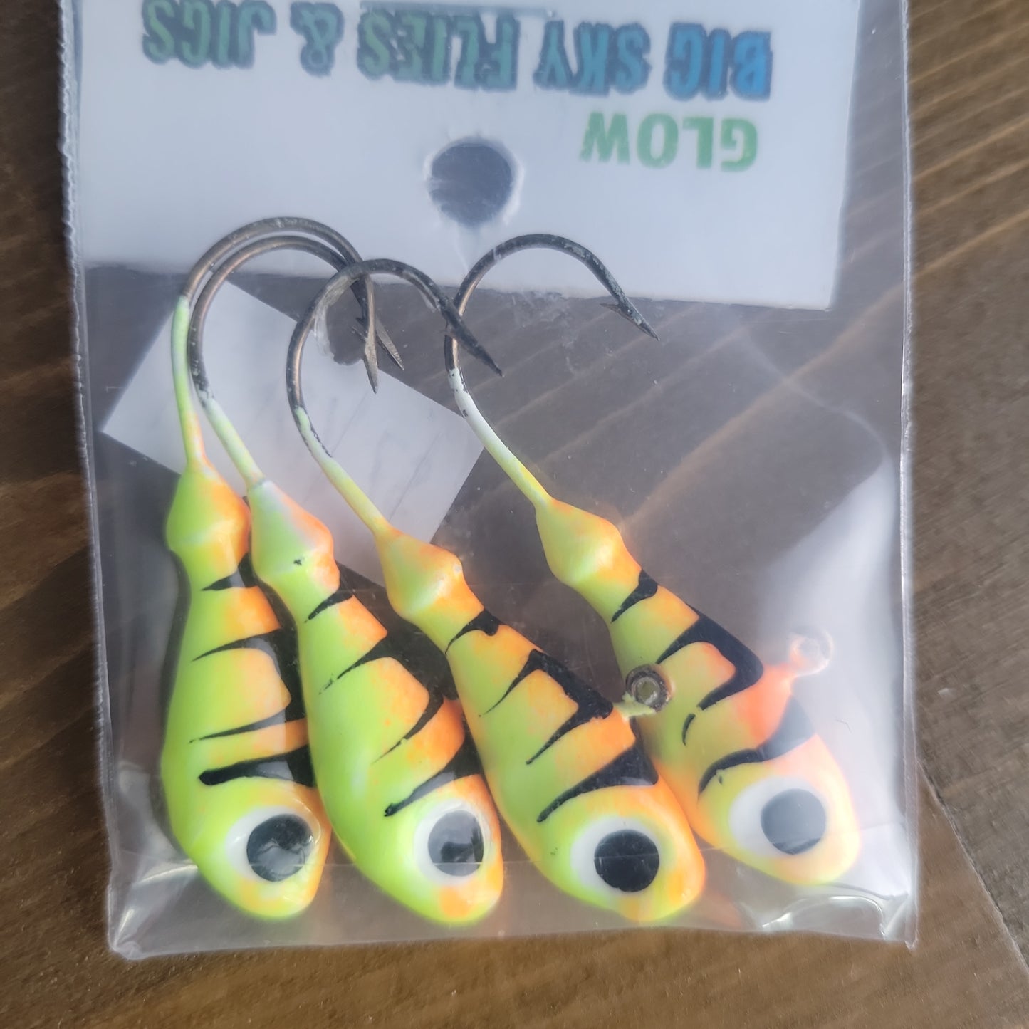 Big Sky Deluxe Ultra Minnow 1/4oz Jigs 4/pack Orange/Lemon w/Black Lines